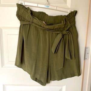 Soft comfy beach shorts. Olive green color with string to tie around the waist.